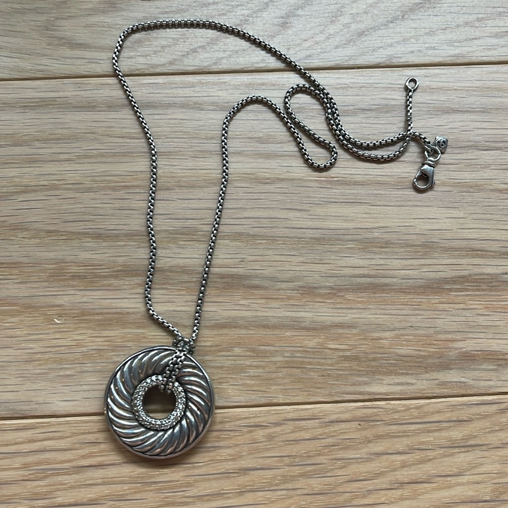 Davis Yurman round pendant necklace with pave diamonds.